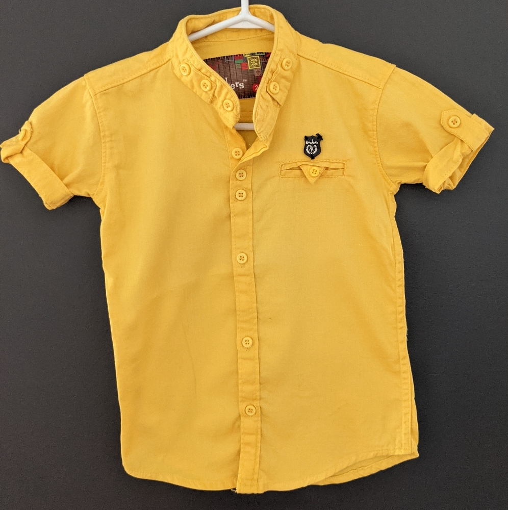 Yellow button down short sleeved shirt